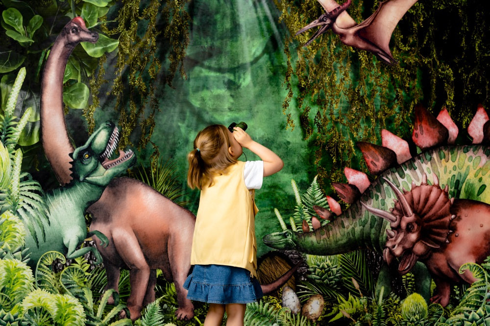 Girl holding binoculars observing dinosaurs in the forest