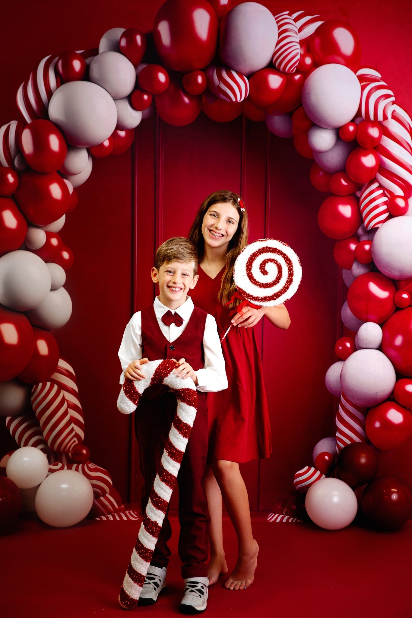 Kate Candycane Balloons Arch Red Wall Backdrop Designed by Megan Leigh Photography