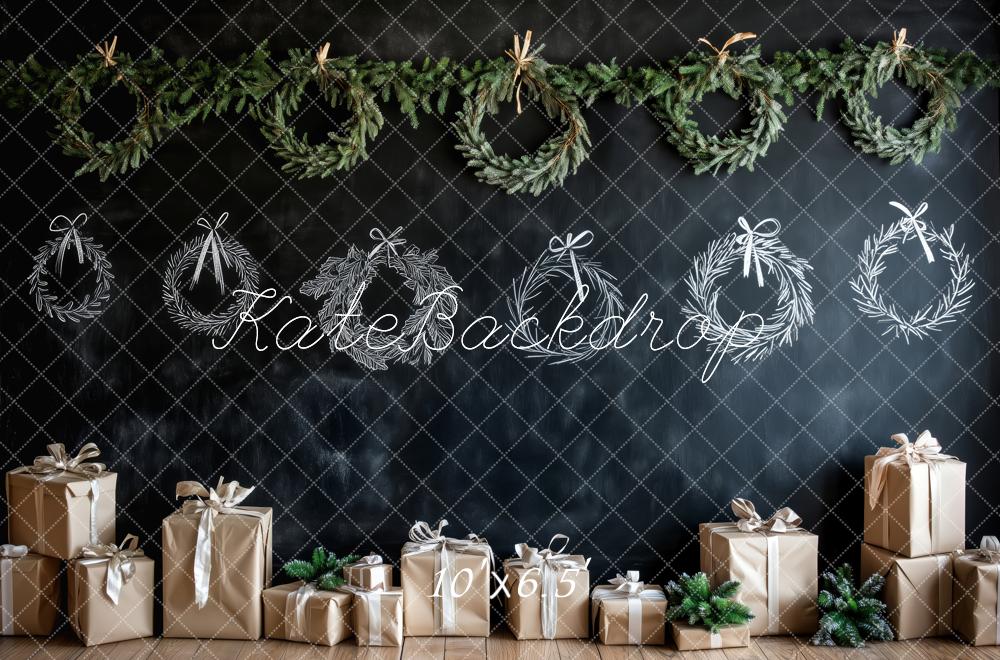 Decorative Christmas backdrop with wreaths and presents against a chalkboard wall.