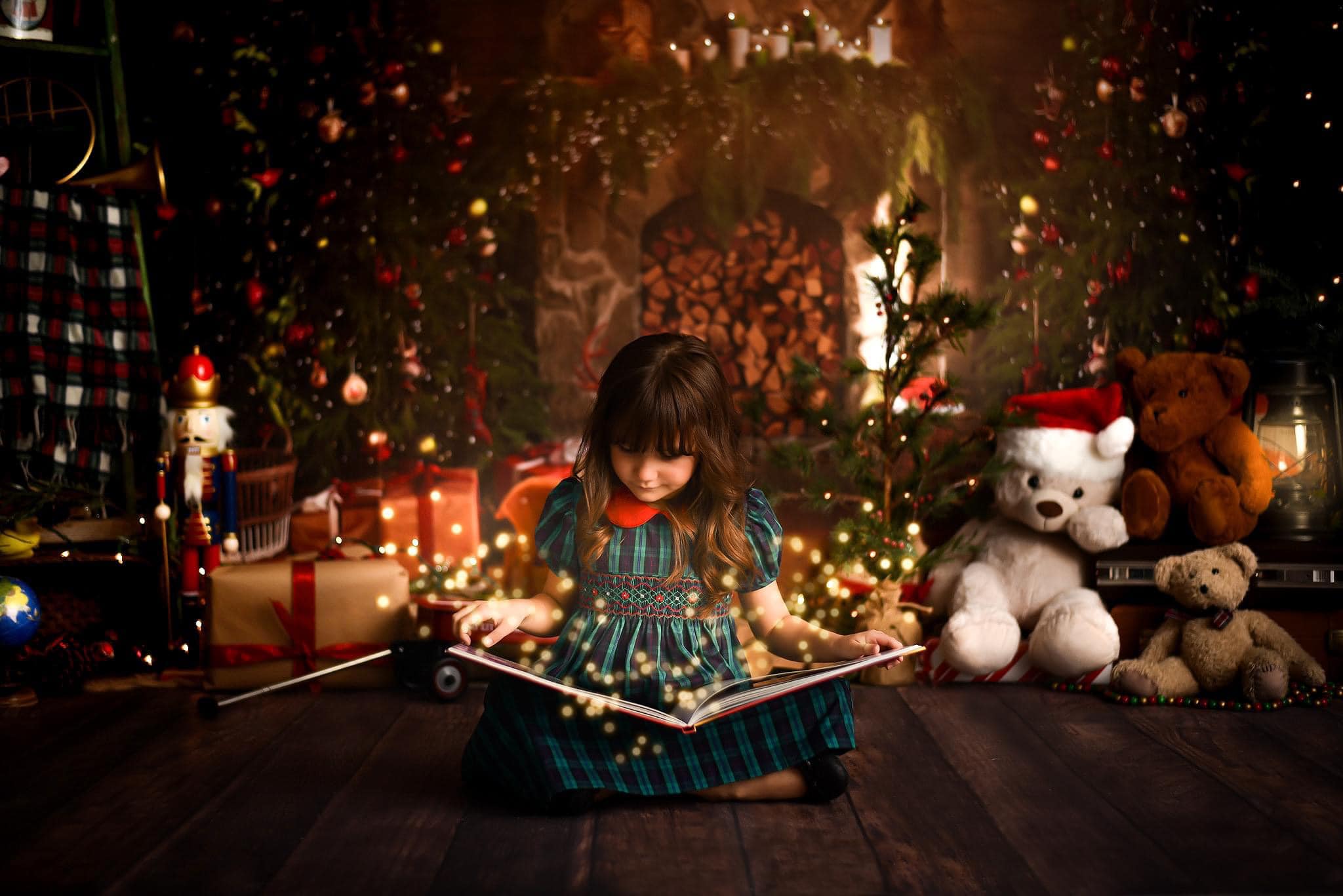 Girl reading a book standing in front of Christmas Tree Fireplace Indoor Backdrop
