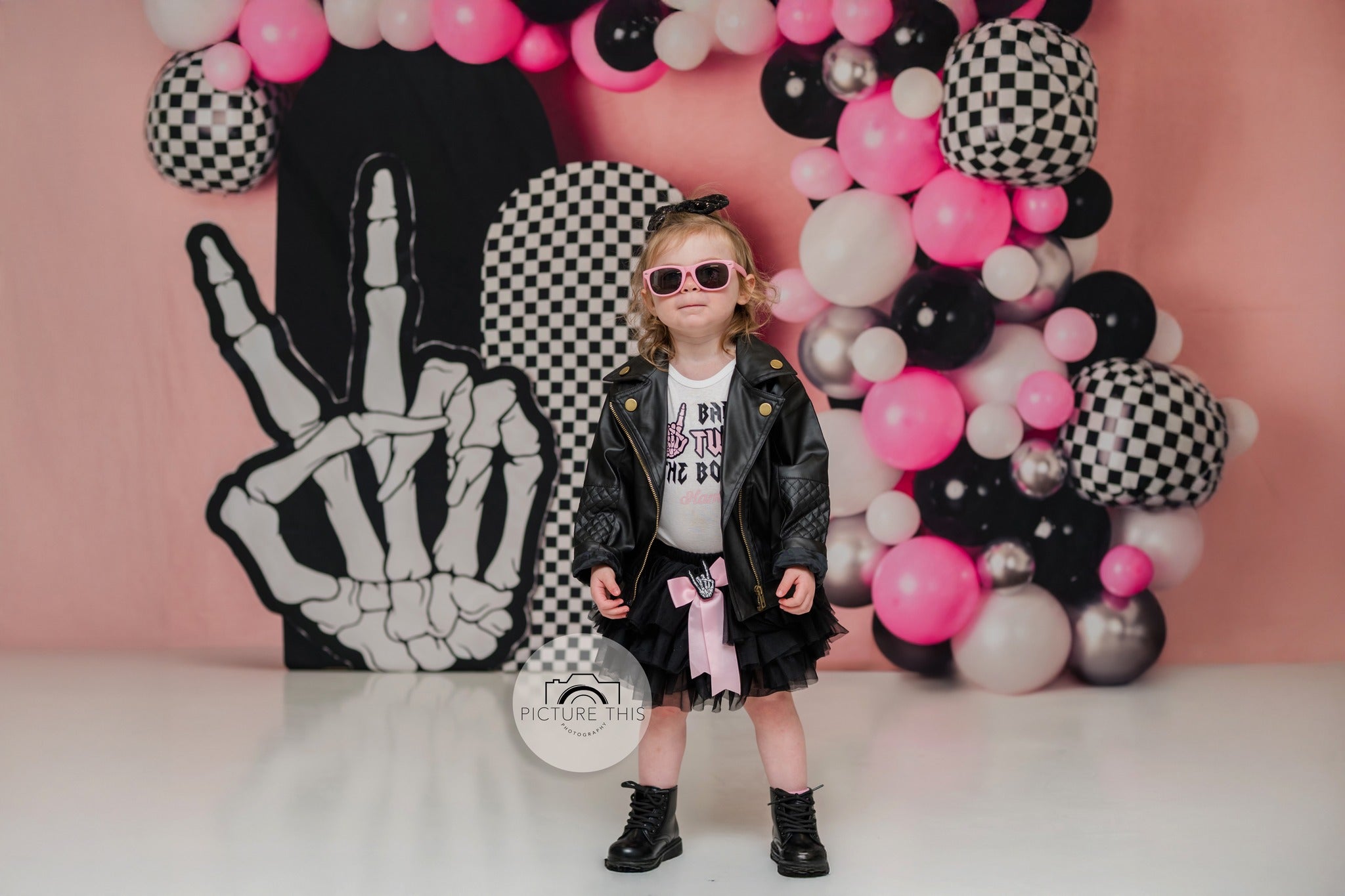 Kate Checkerboard Skeleton Hand Balloon Arch Backdrop Designed by Mandy Ringe