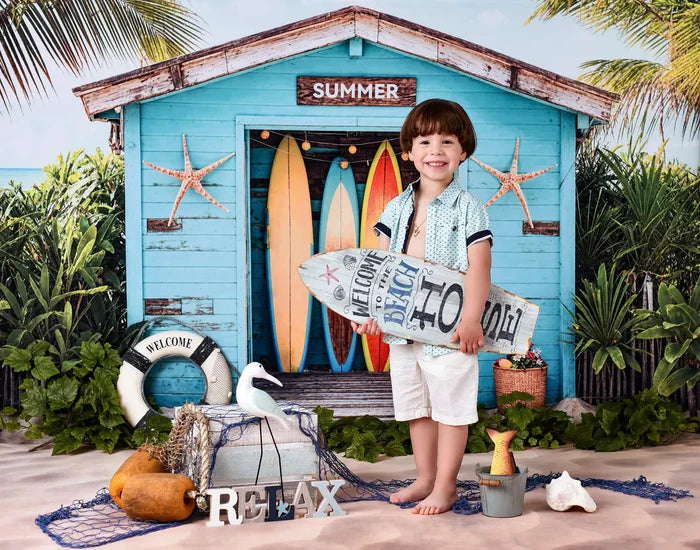 Boy standing in front of summer fruit stand background