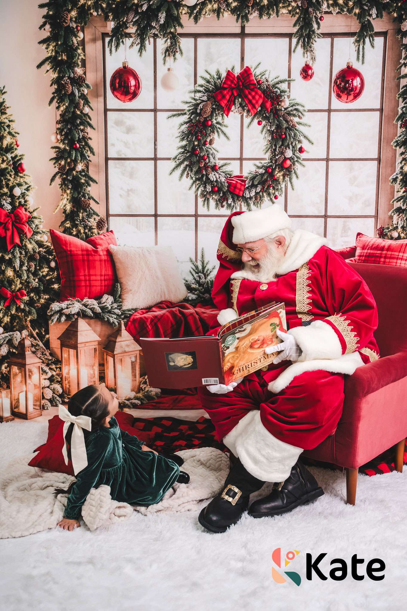 Santa Claus reading a book to a child in a festive room with Christmas decorations.